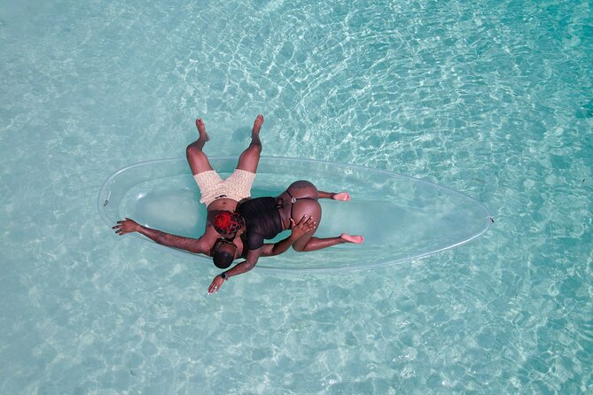 Clear Kayak Drone and Beach Private Photography in The Bahamas - Entering the water at Love Shack
