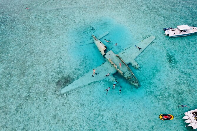 Exuma Full Day Swimming Pigs Group Boat Tour - The underwater plane wreck