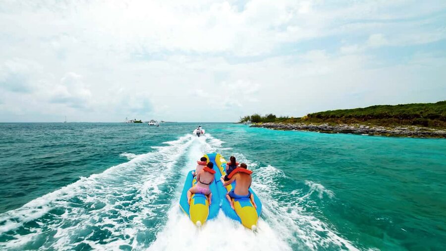 Mansa Bay w/ Swimming Pigs, Banana Boat, JetSki & Snorkeling - A 15-minute jet ski ride in turquoise water