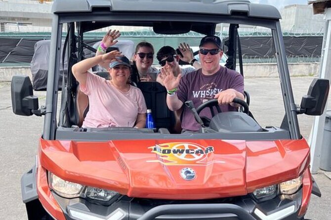 Nassau Adventure: Jeep Rental with Bluetooth Speaker - Driving on the left in an open-top 4x4