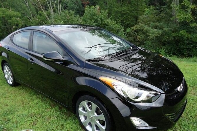 Private Roundtrip Sedan Airport Transfer to Paradise Island - The return journey to the airport